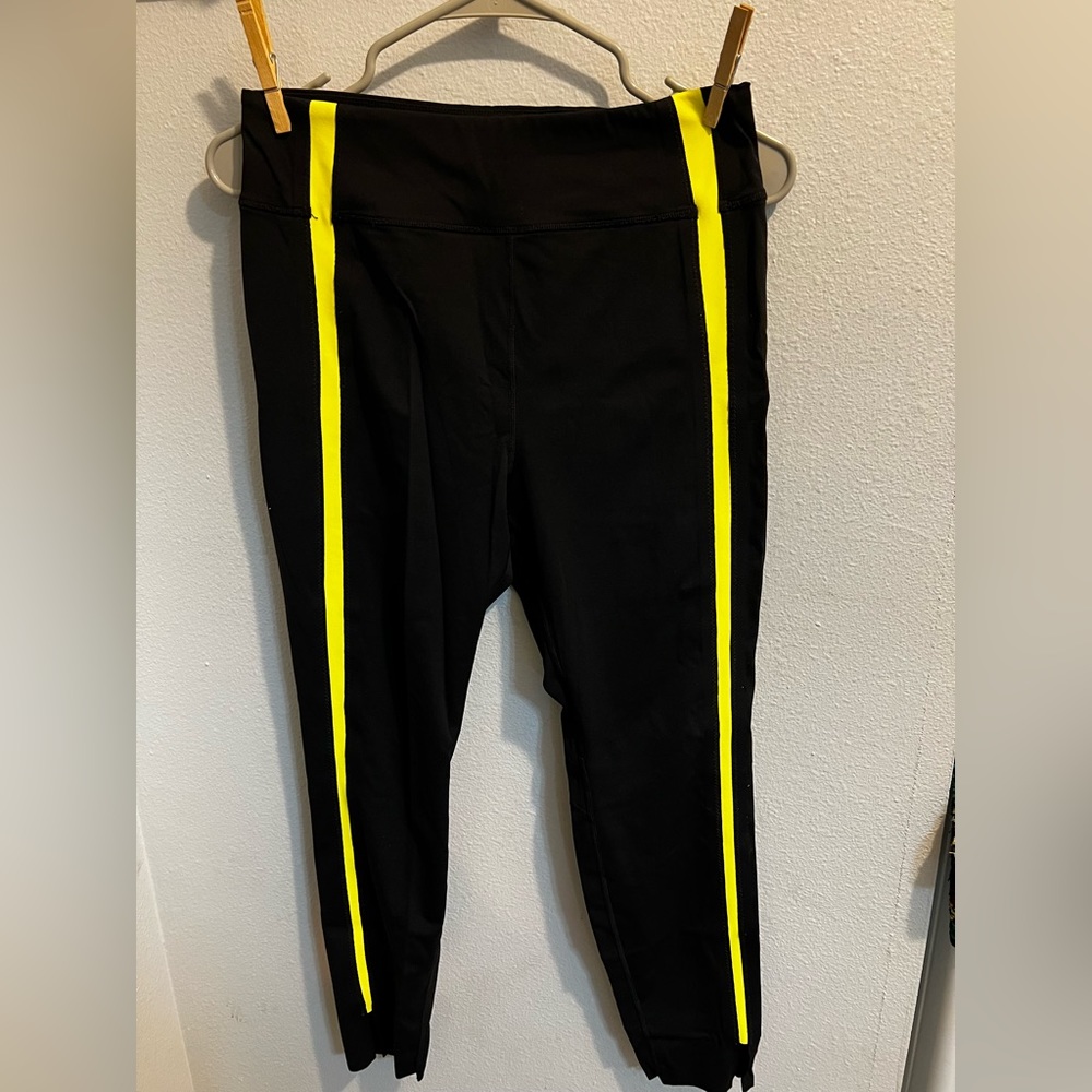 Zyia black leggings with bright yellow stripe size 8/10